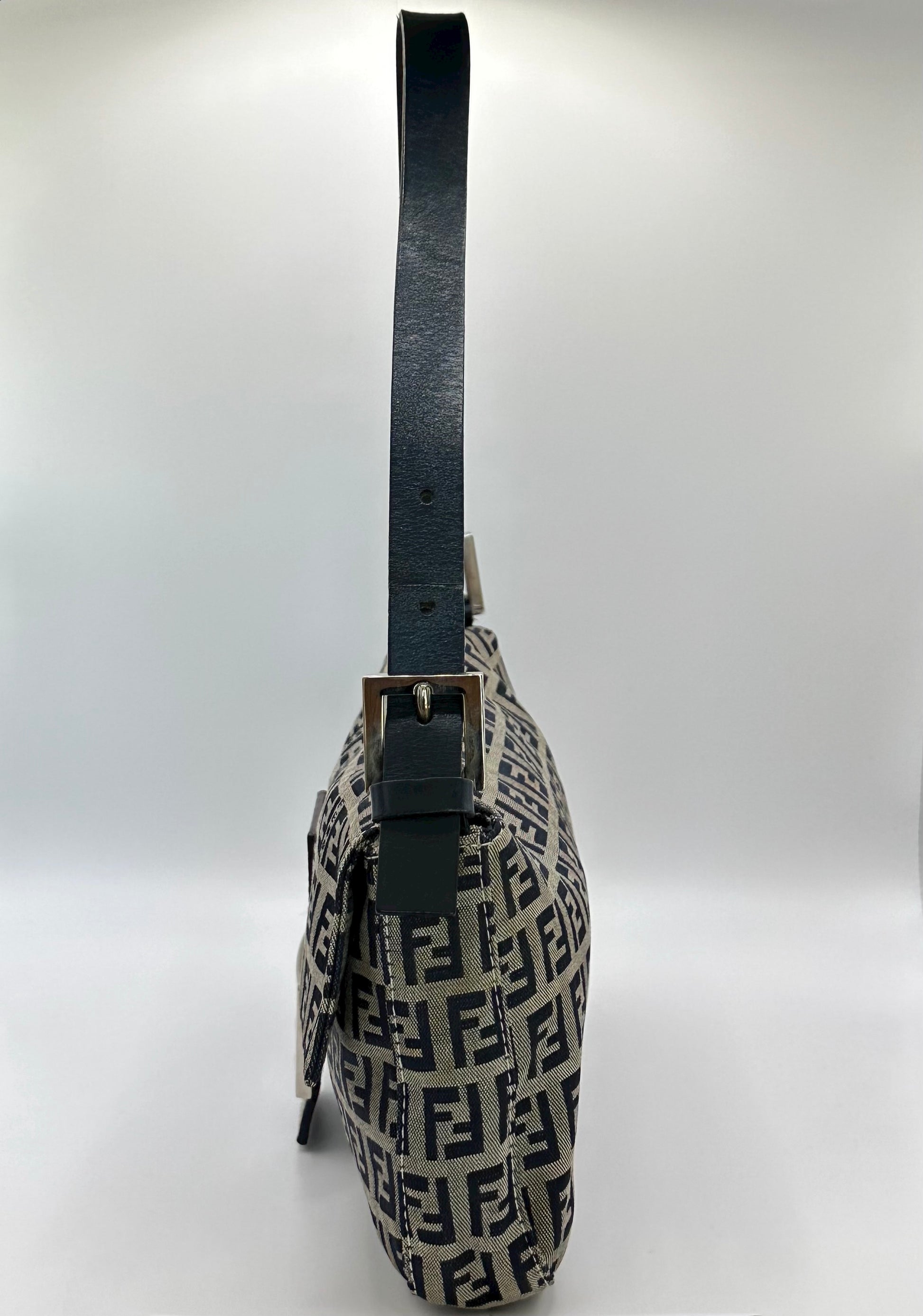 Vintage fendi baguette in navy colour with silver hardware side photo