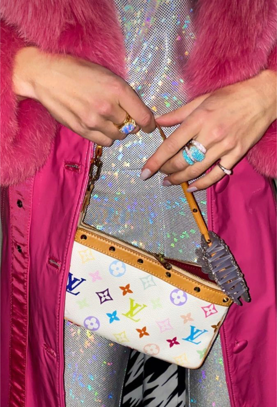 vintage louis vuitton takashi murakami bag styled with silver sequin outfit pink furry jacket 