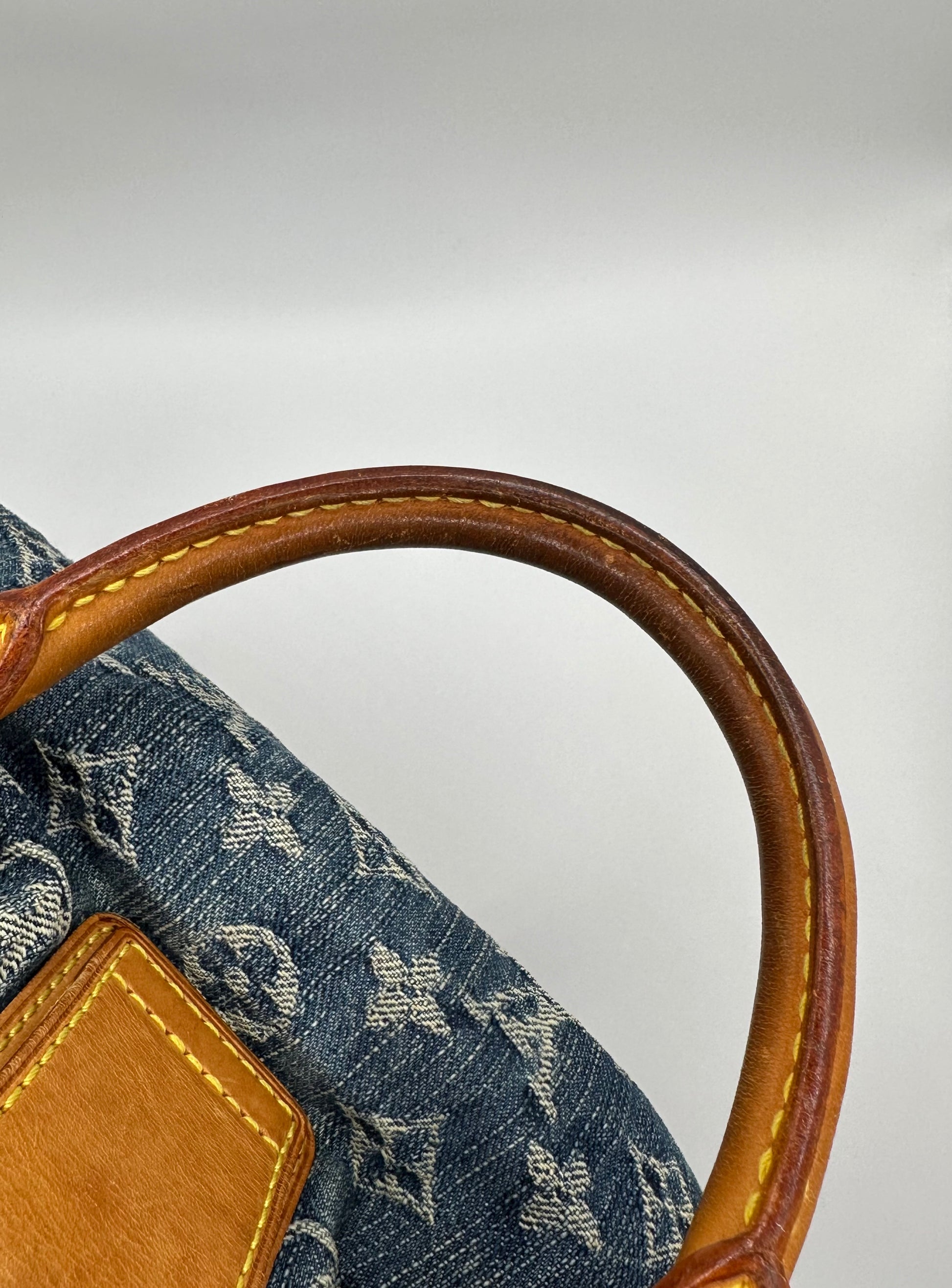 Louis Vuitton Denim Pleaty Bag Top Handles photo