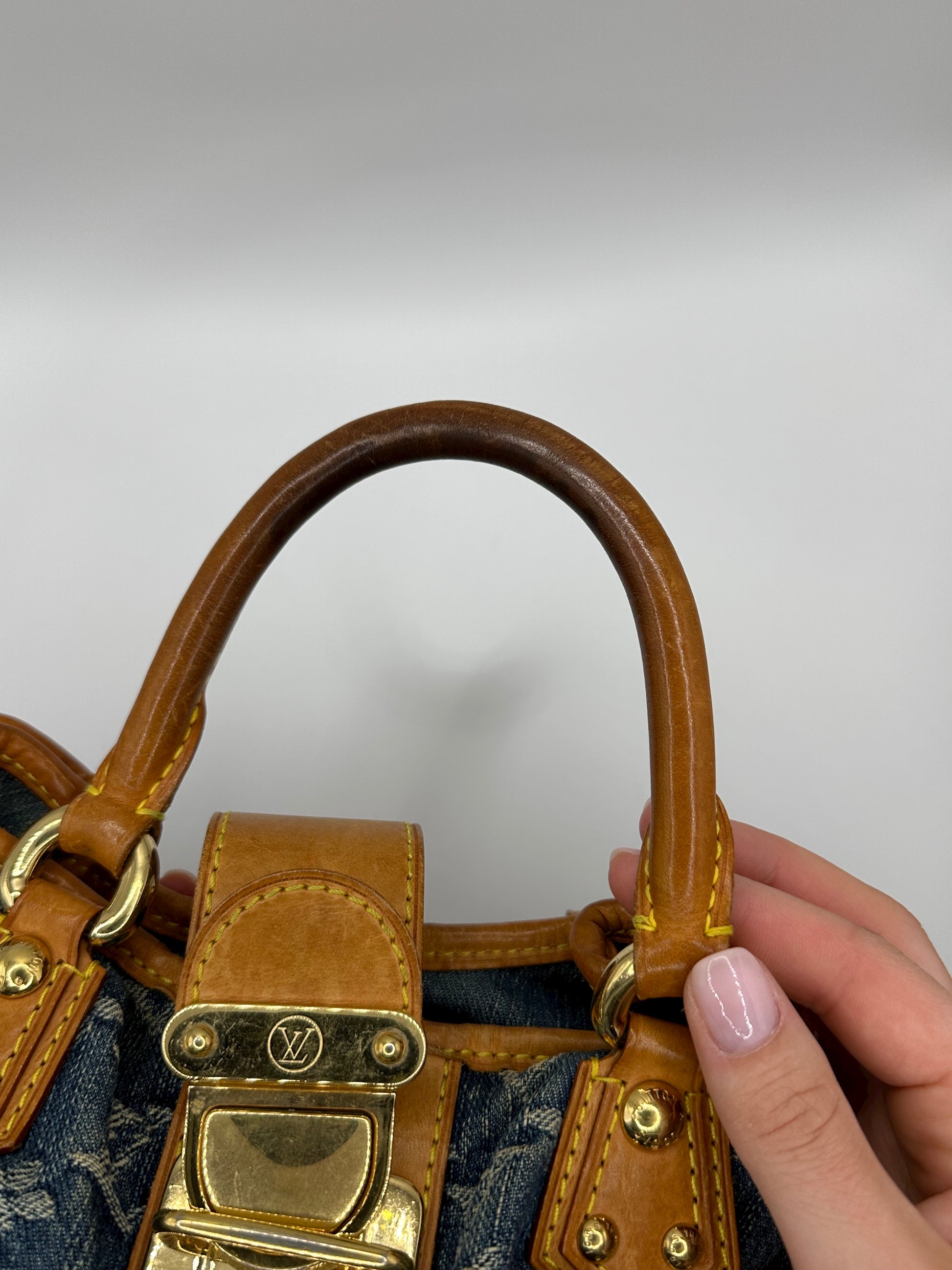 Louis Vuitton Denim Pleaty Bag Top Handles photo