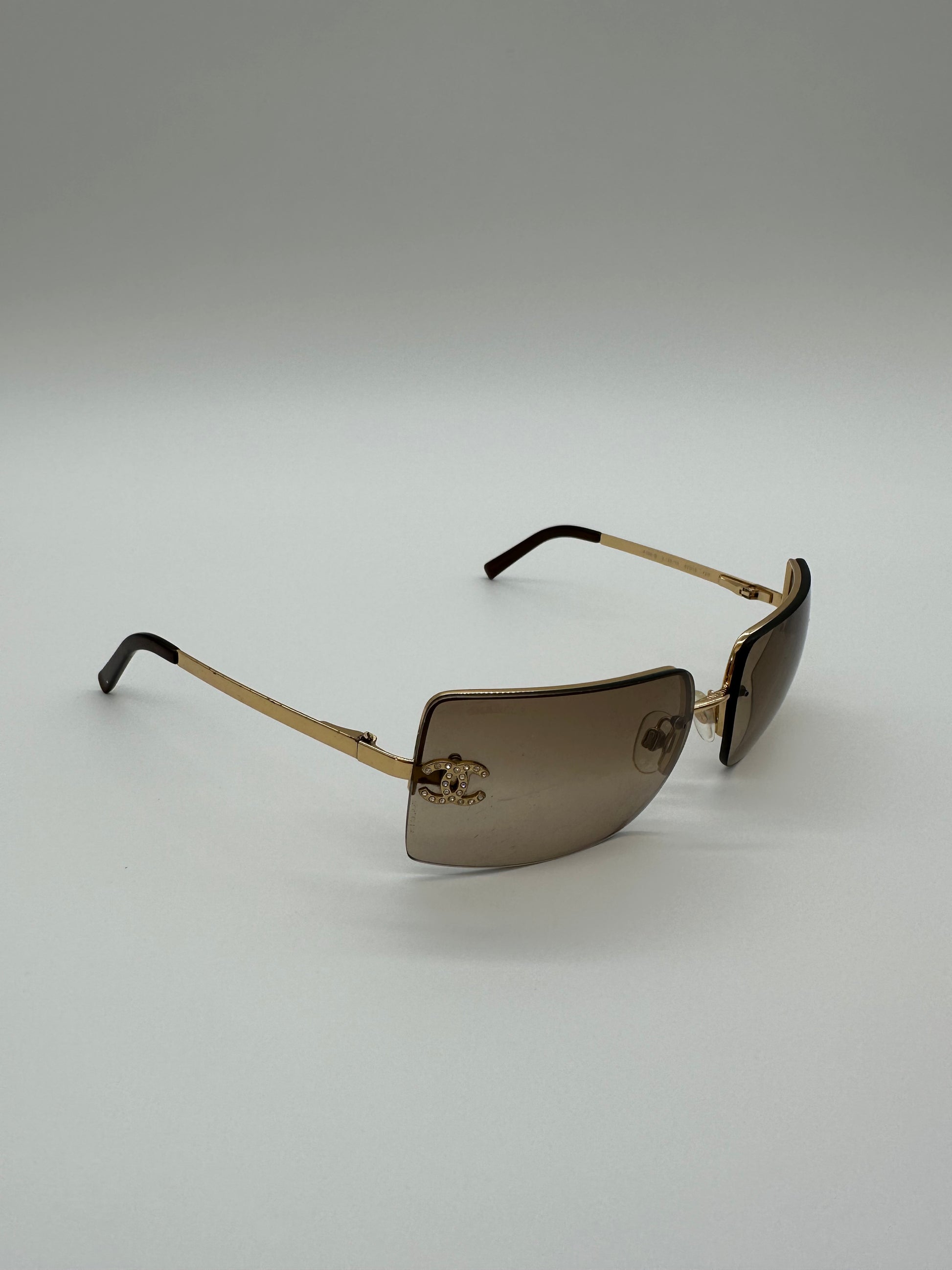 Vintage Gold Rimmed Chanel Sunglasses – by nothing new